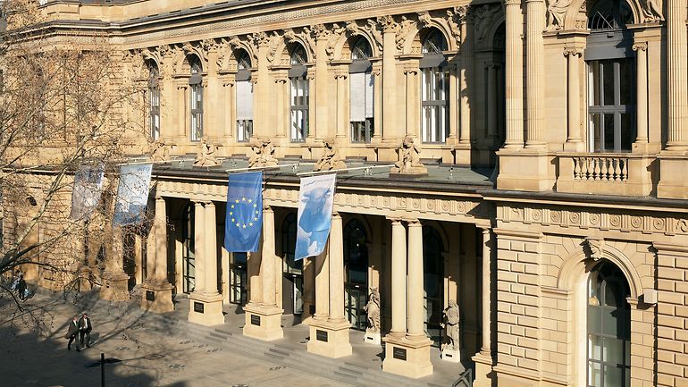Stock exchange building with flags